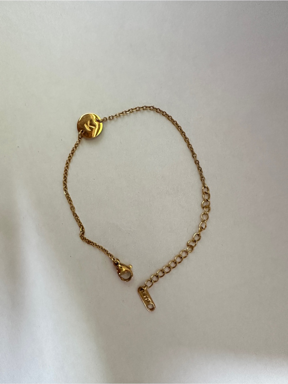 gold-plated initial “K” bracelet 15.5”